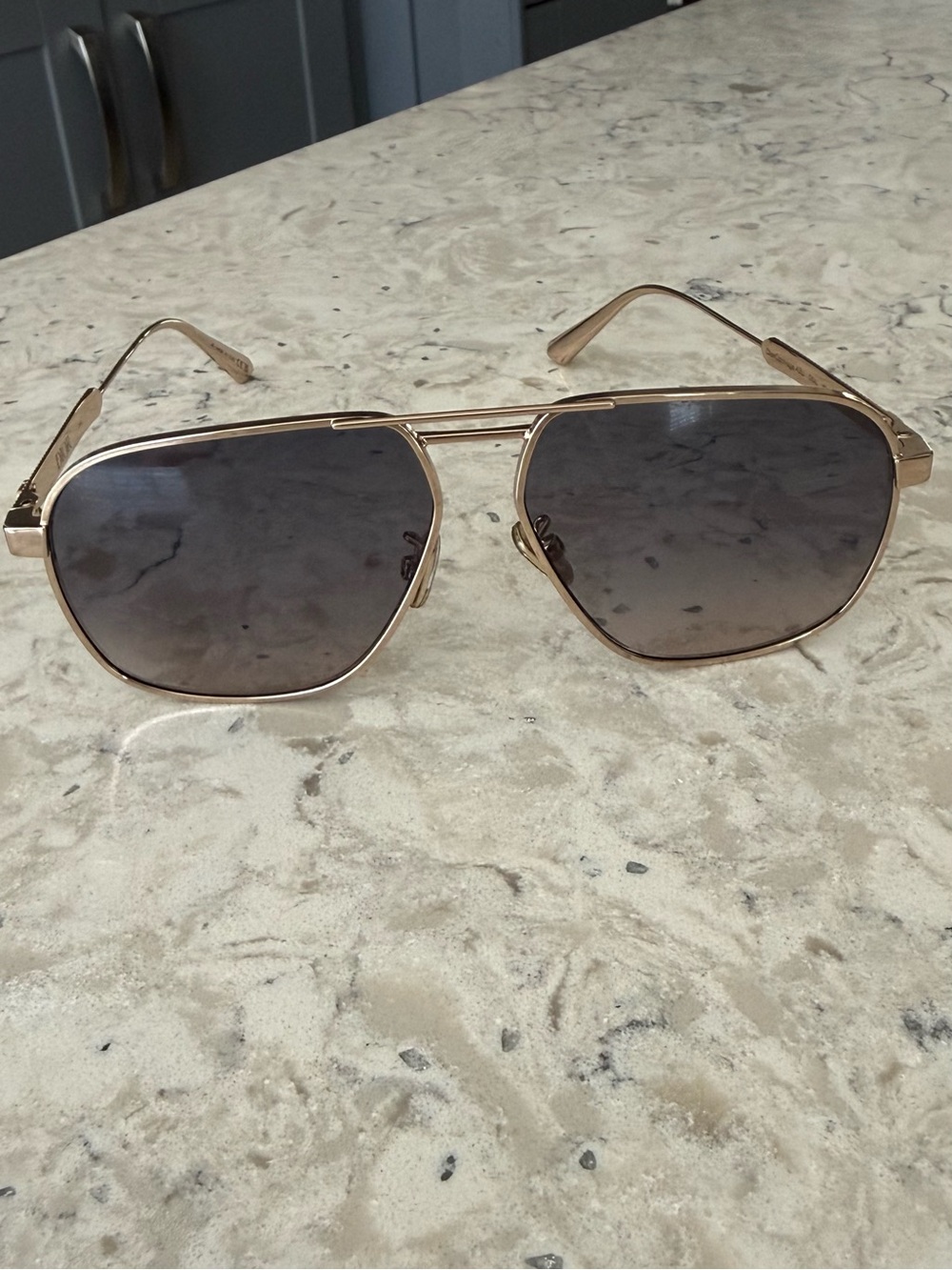 Gucci Silver Frame women’s Sunglasses with Grey Lenses